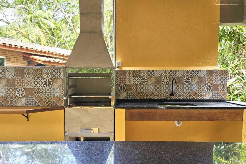 Casa com piscina a 500m da Praia Brava - Ubatuba