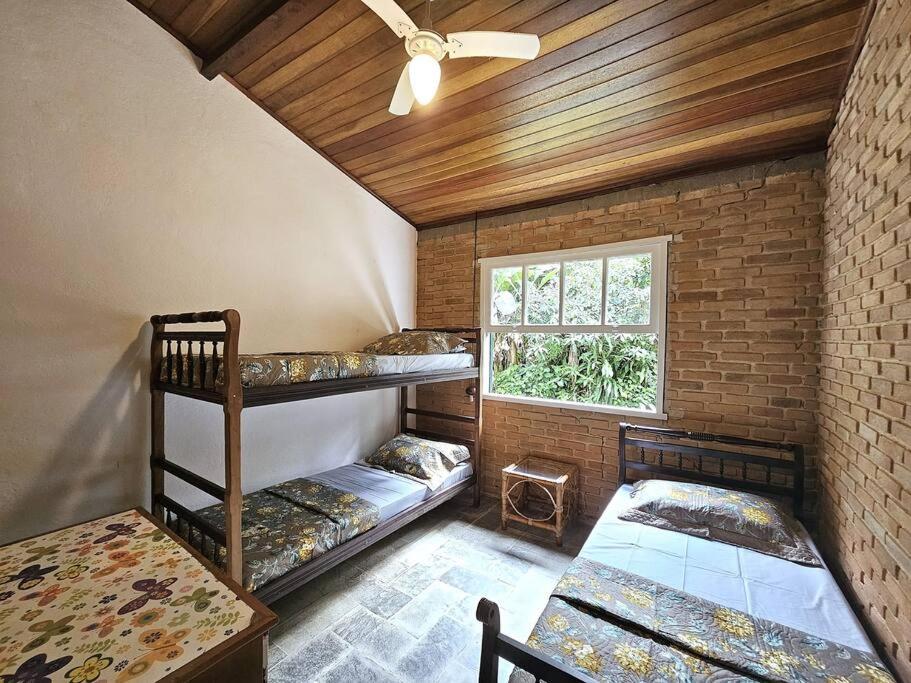 Casa com piscina a 500m da Praia Brava - Ubatuba