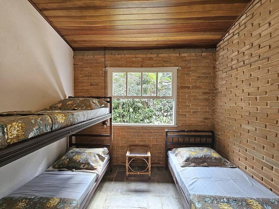 Casa com piscina a 500m da Praia Brava - Ubatuba