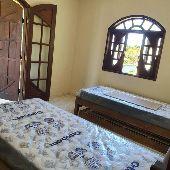 Pé na areia, água de coco, mar!