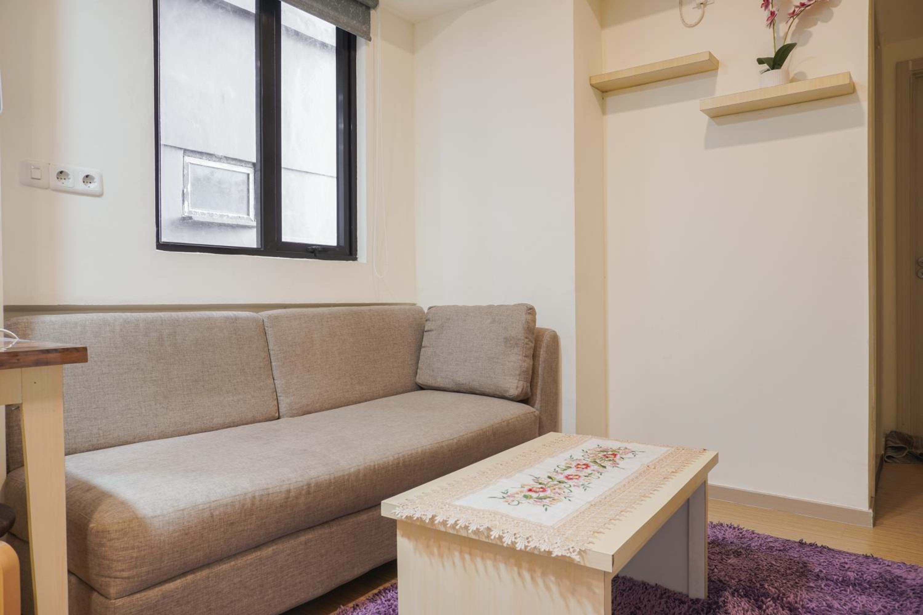 Comfort 1BR with Working Room at Meikarta Apartment By Travelio view 2