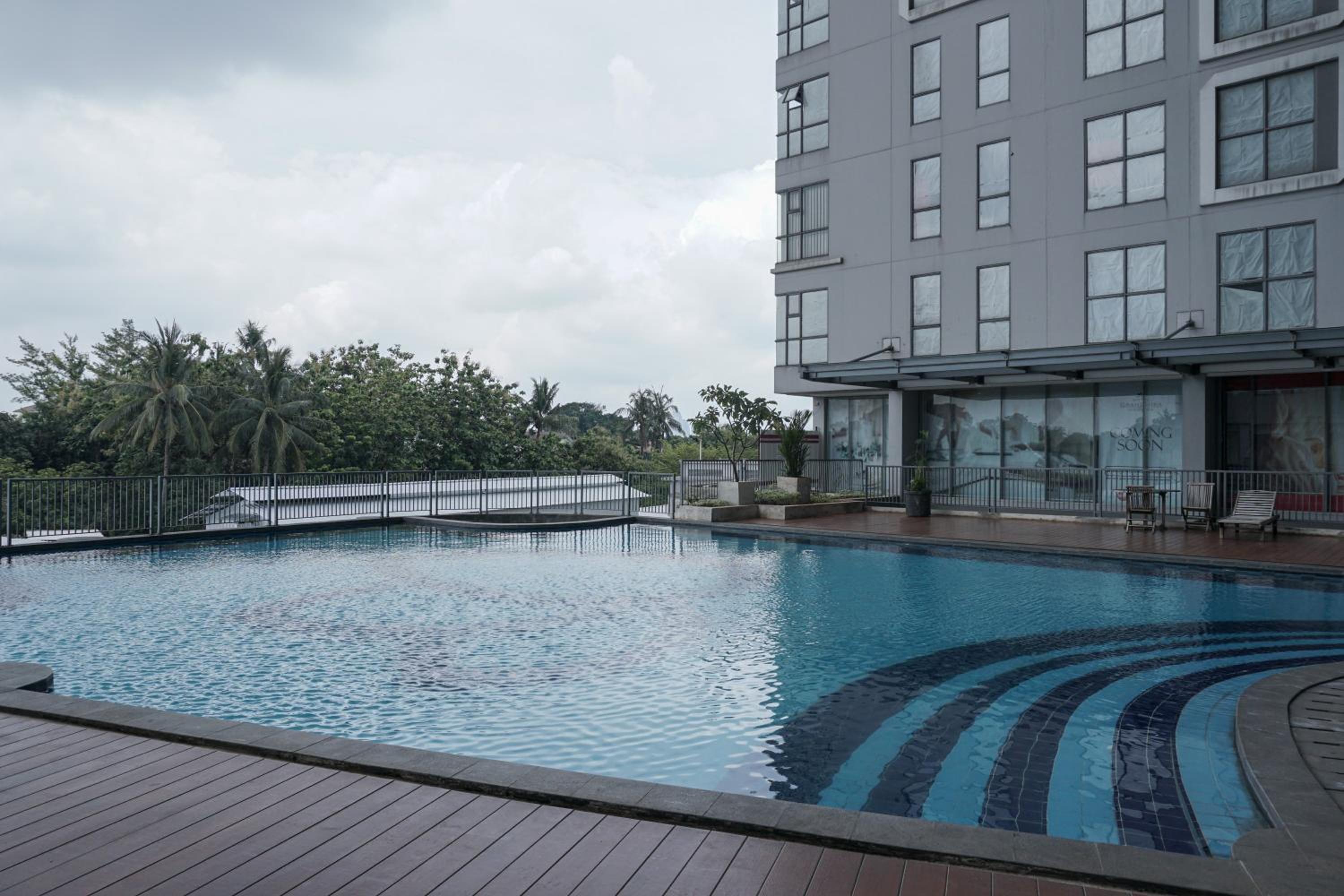Attractive 1BR Apartment at Royal Olive Residence By Travelio view 4