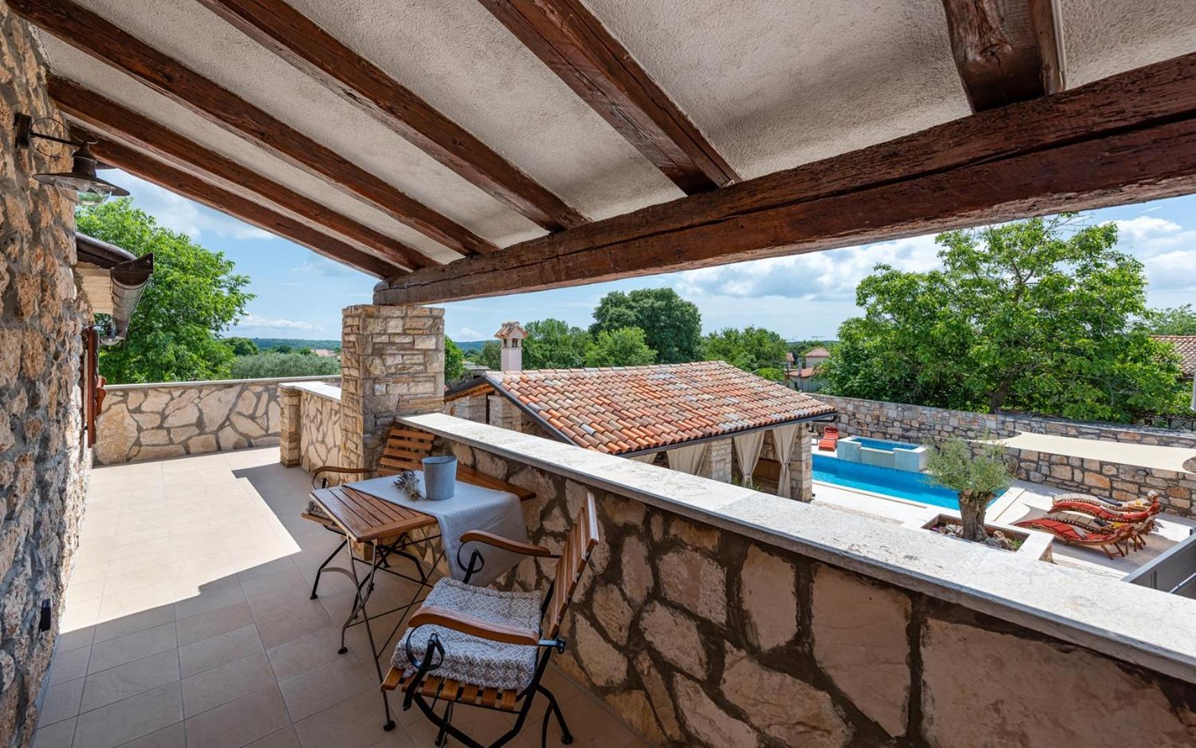 Rustic stone holiday house with pool view 5