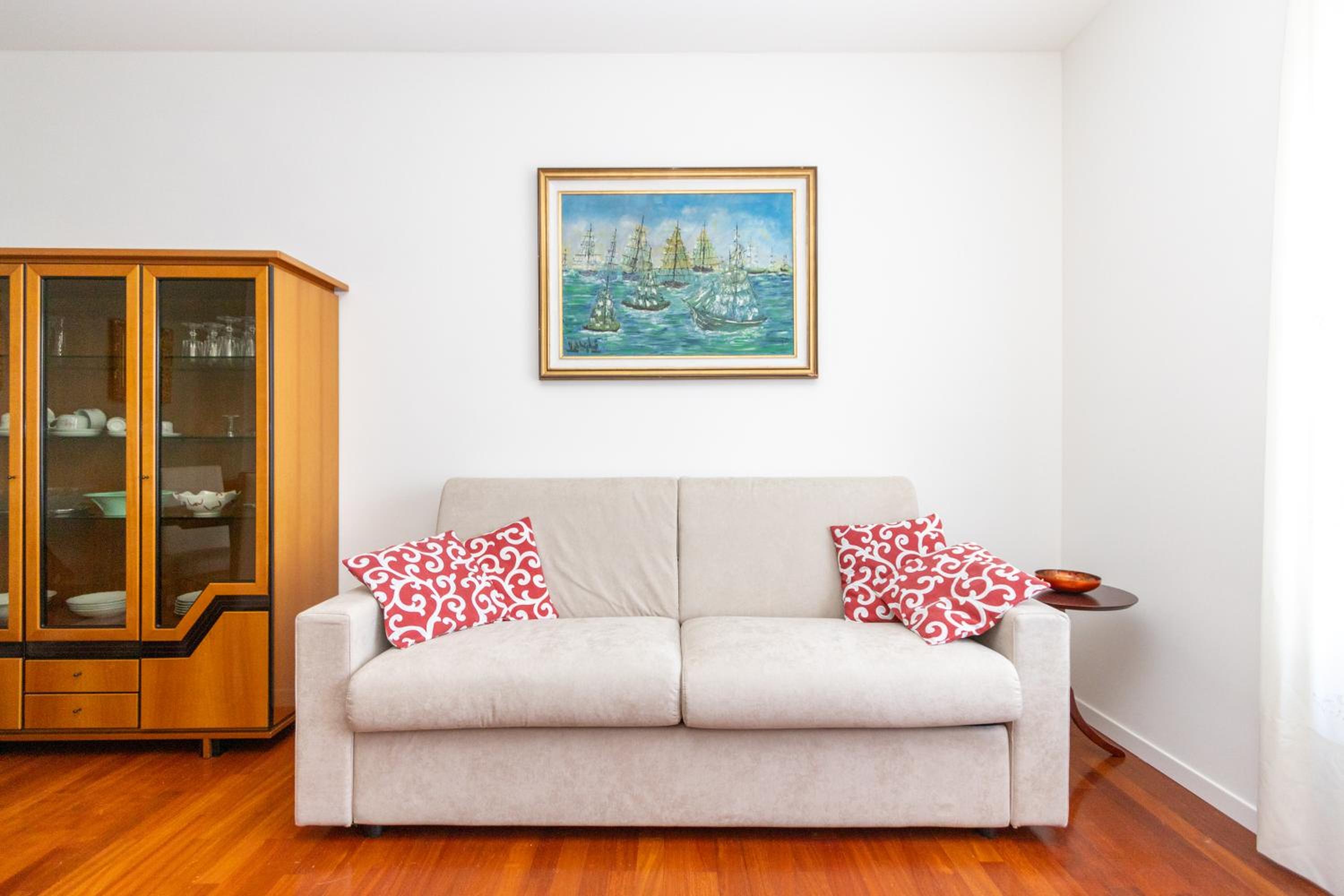 Modern suite with balcony and park view