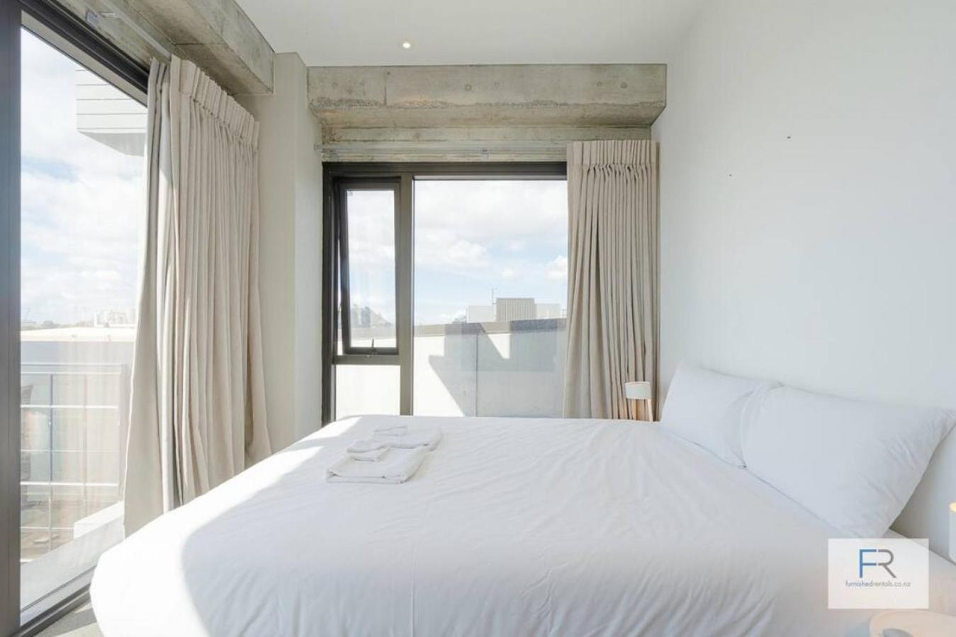 Luxury Designer Apartment by Furnished Rentals view 2