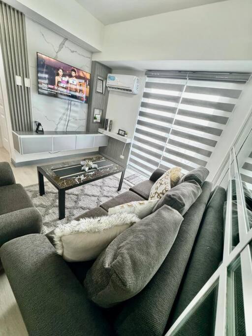 2BR Mountain View Cabin - The Bali Corner at Azure North view 4