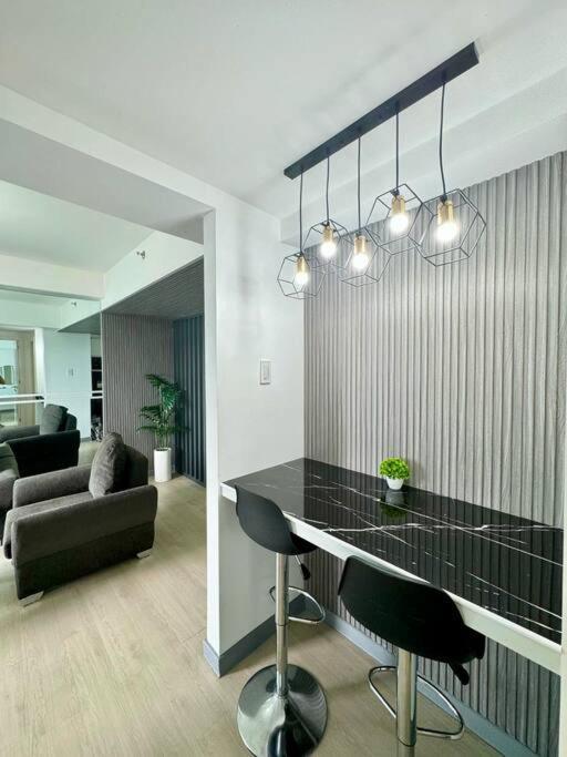 2BR Mountain View Cabin - The Bali Corner at Azure North view 5