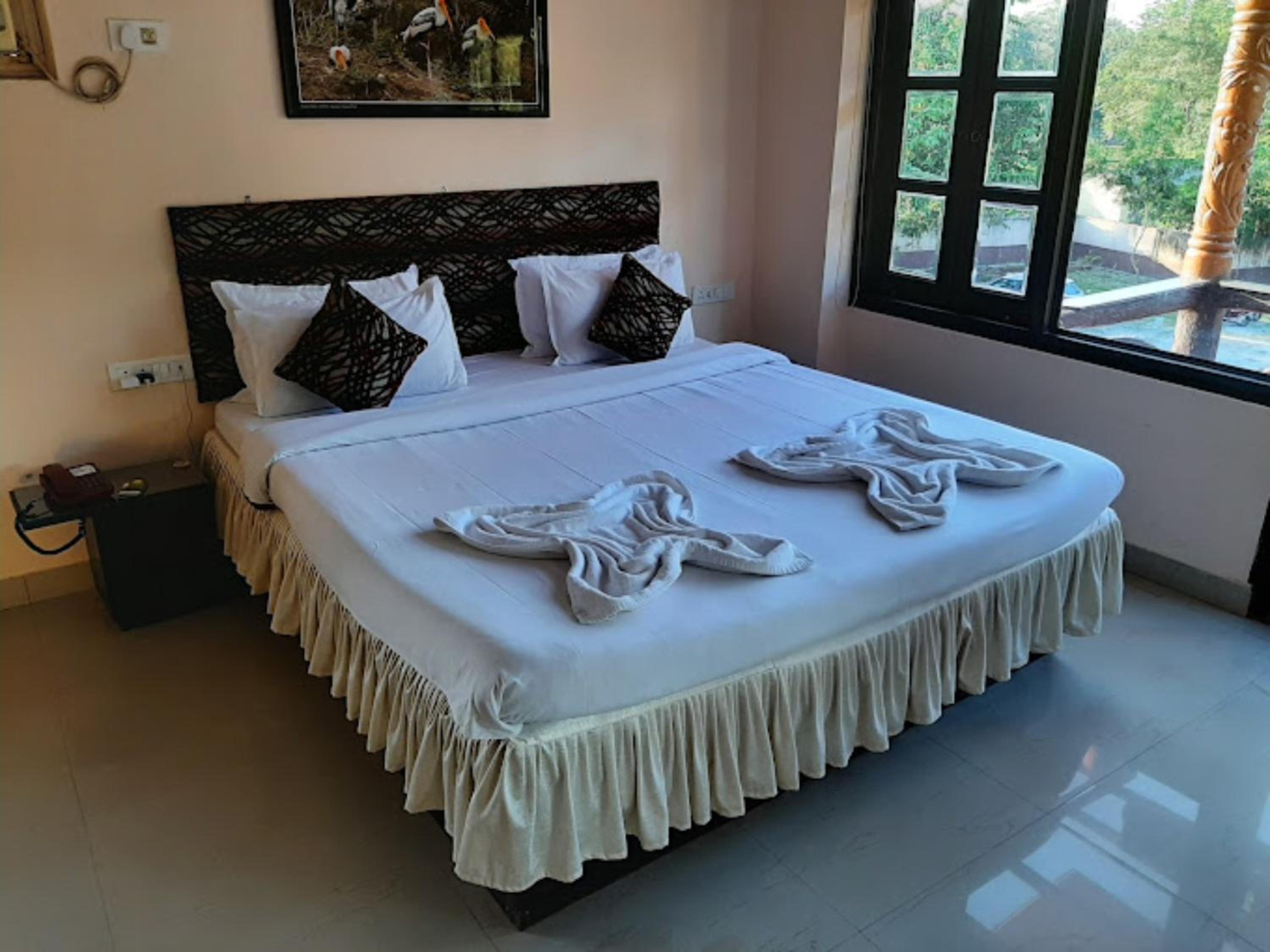 Hotel Dreamland Lataguri হোটেল ড্রিমল্যান্ড লাটাগুড়ি All-Room-Attached-Balcony-with-lift-Restaurant-wifi-Swimming pool-Children Play Ground -Parking Facil view 2