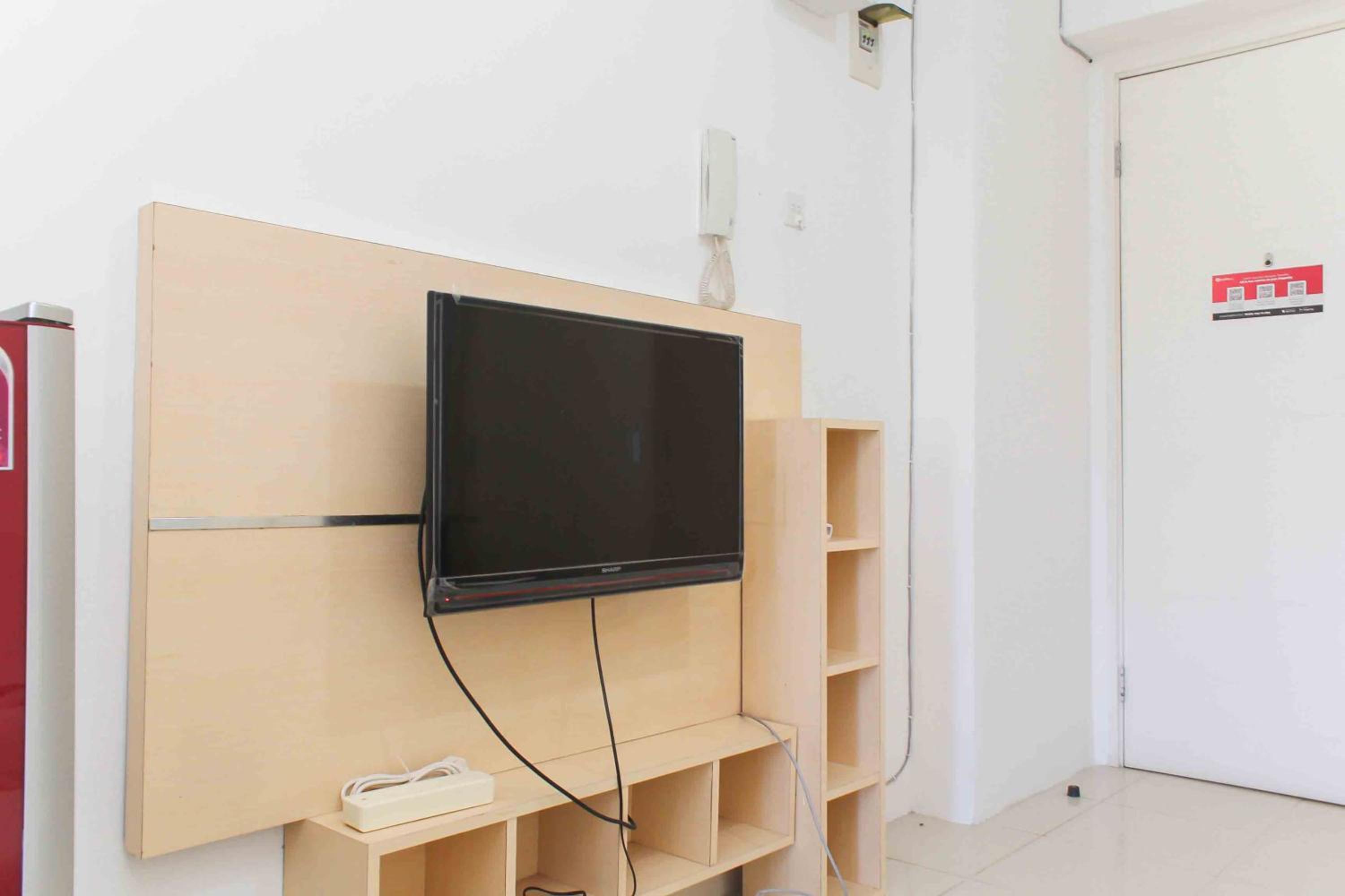 Simple and Cozy Living Studio Room at Bassura City Apartment By Travelio view 4