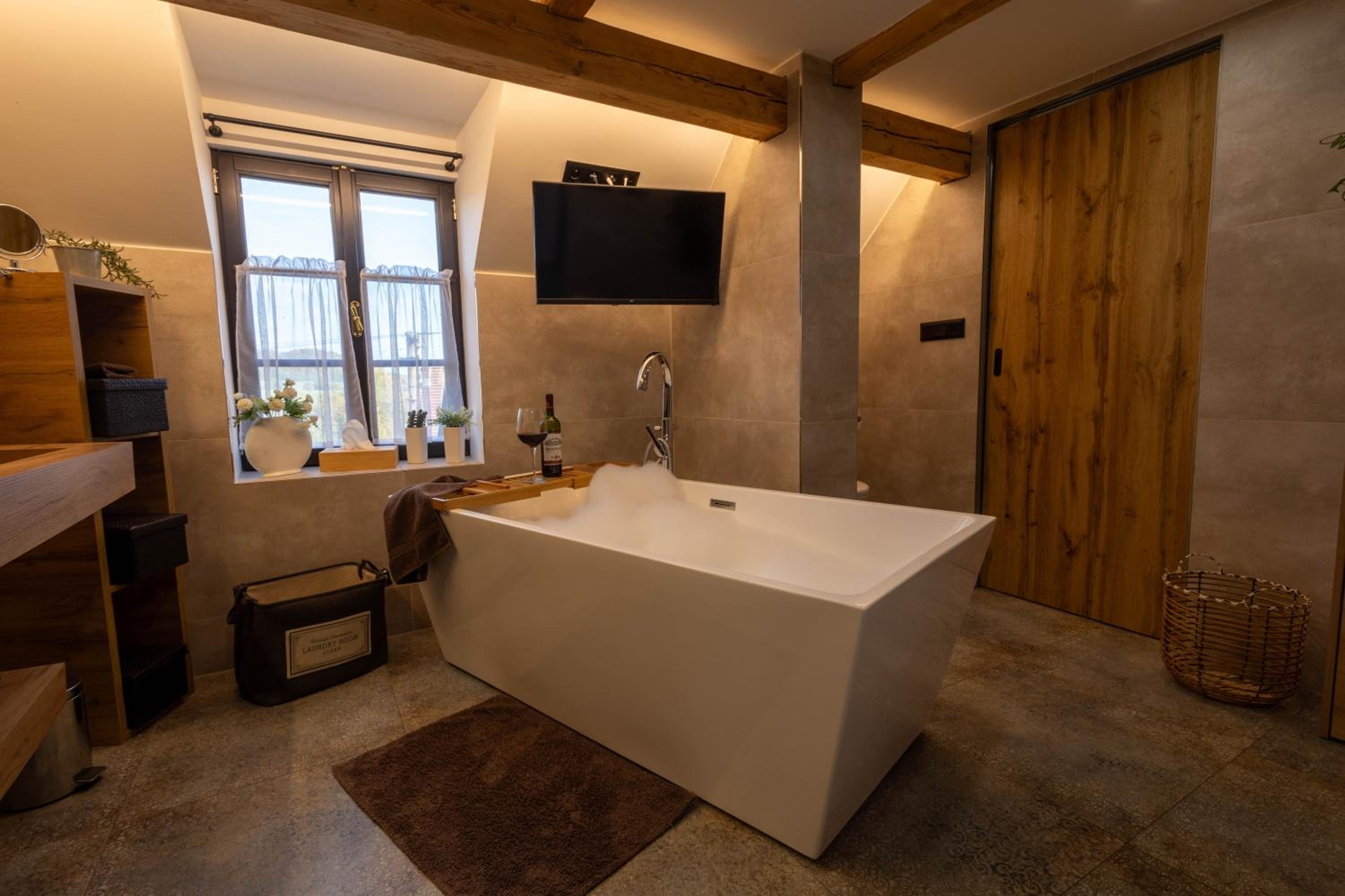 Podkrovní stylový mezonetový apartmán