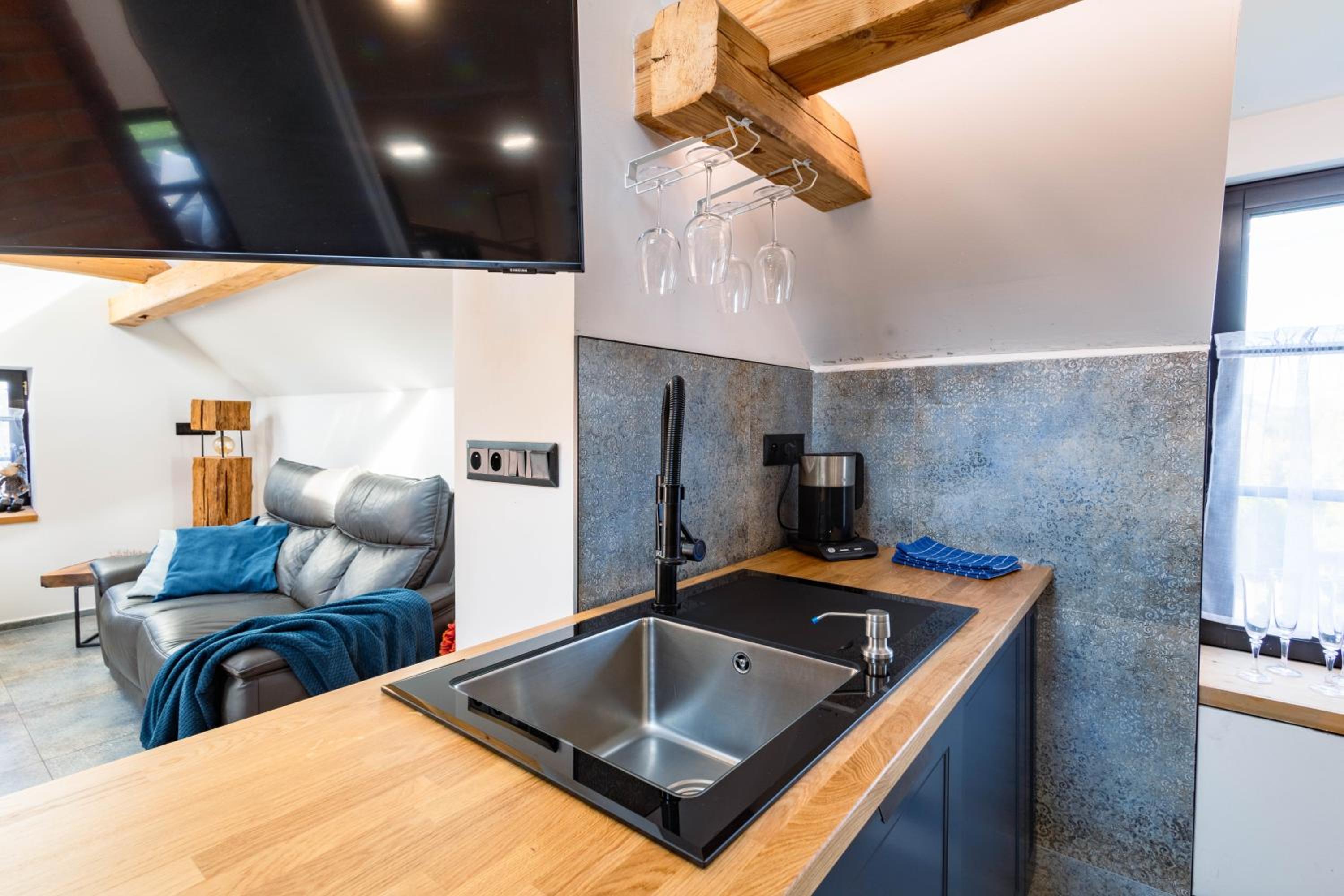 Podkrovní stylový mezonetový apartmán