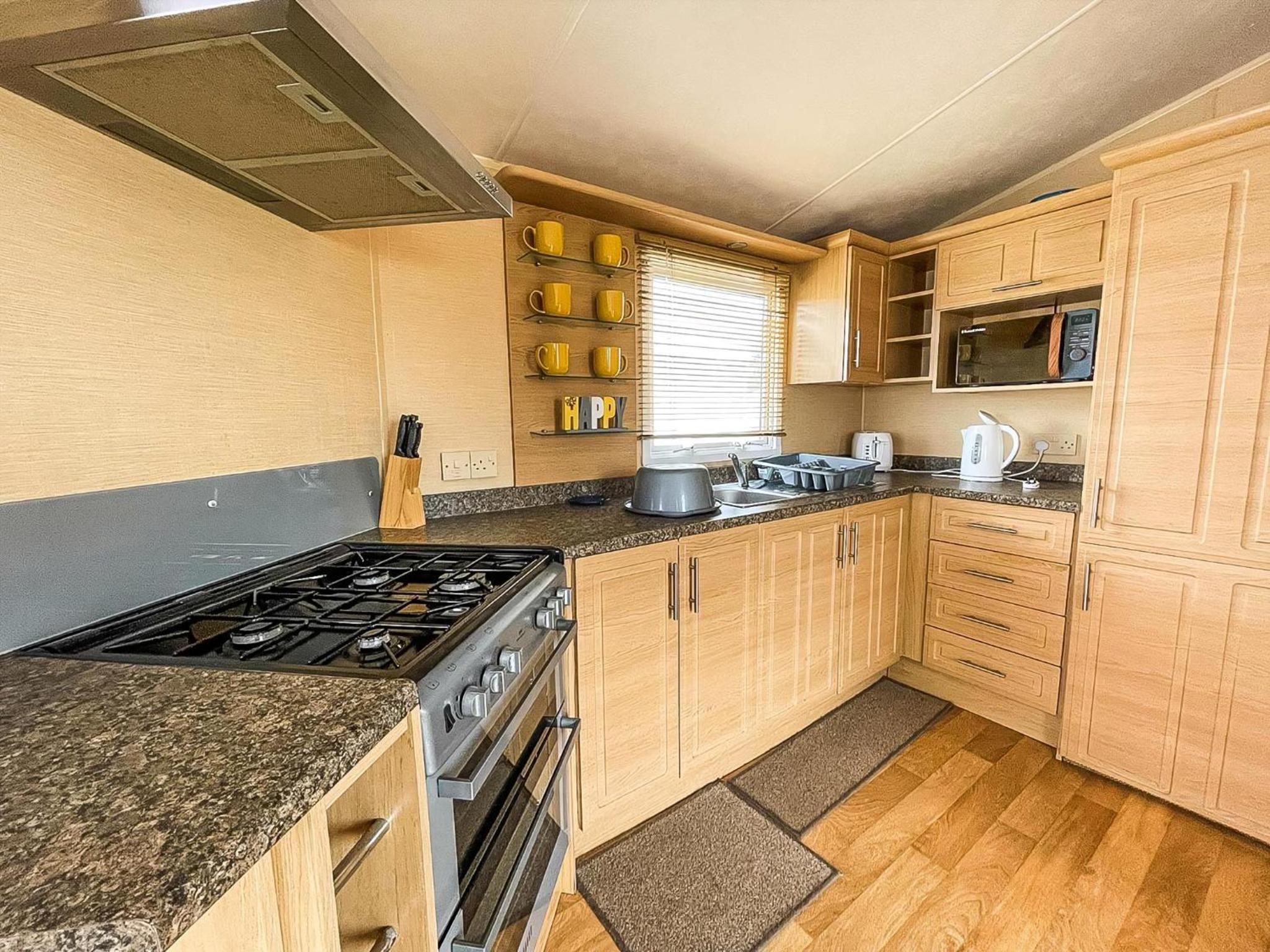 Great 6 Berth Caravan With Decking By The Beach In Suffolk Ref 40023Nd view 3