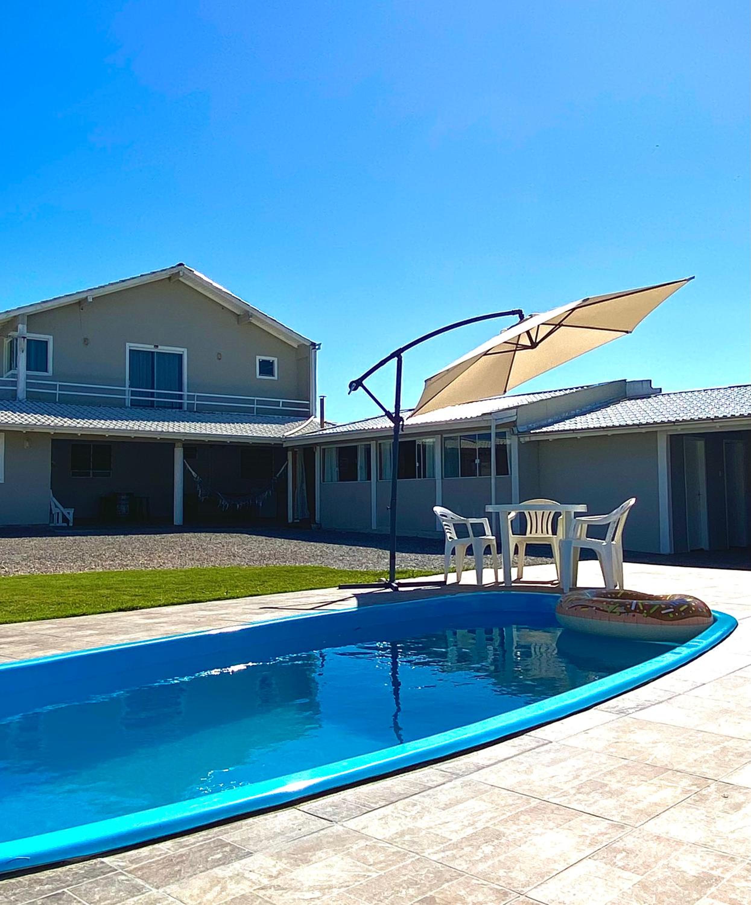 Casa com piscina, hidro e uma vista linda da lagoa