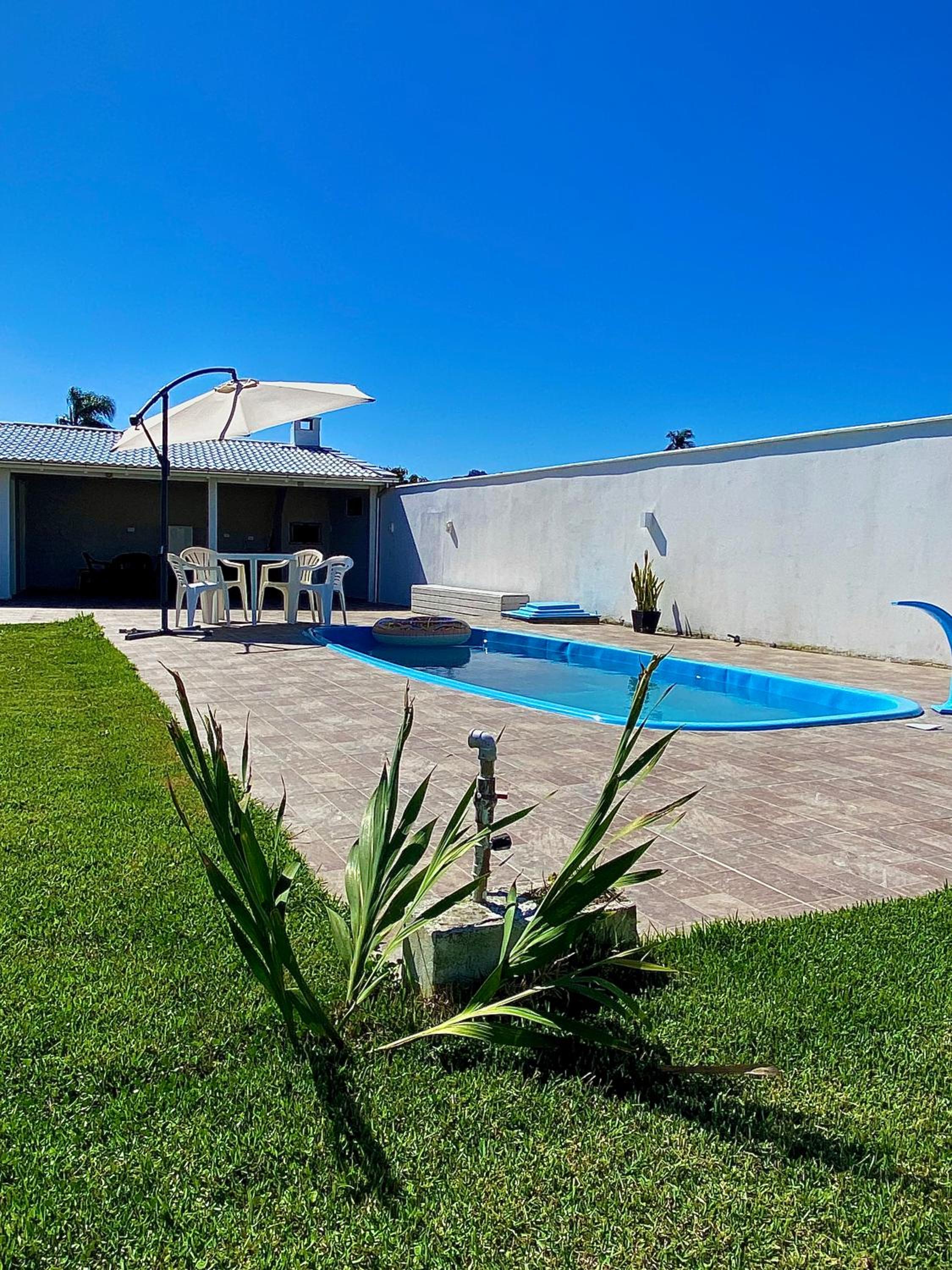 Casa com piscina, hidro e uma vista linda da lagoa