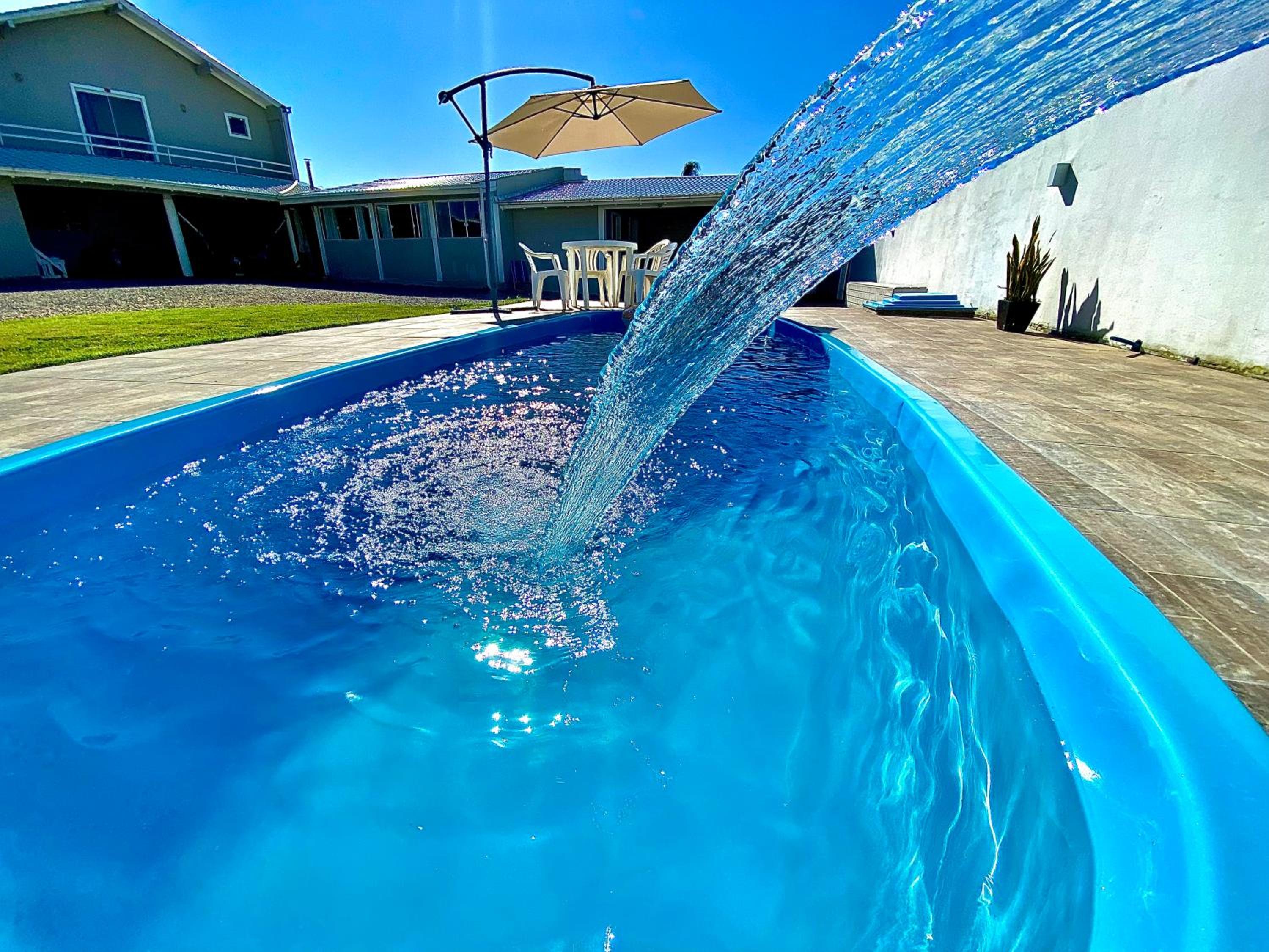 Casa com piscina, hidro e uma vista linda da lagoa