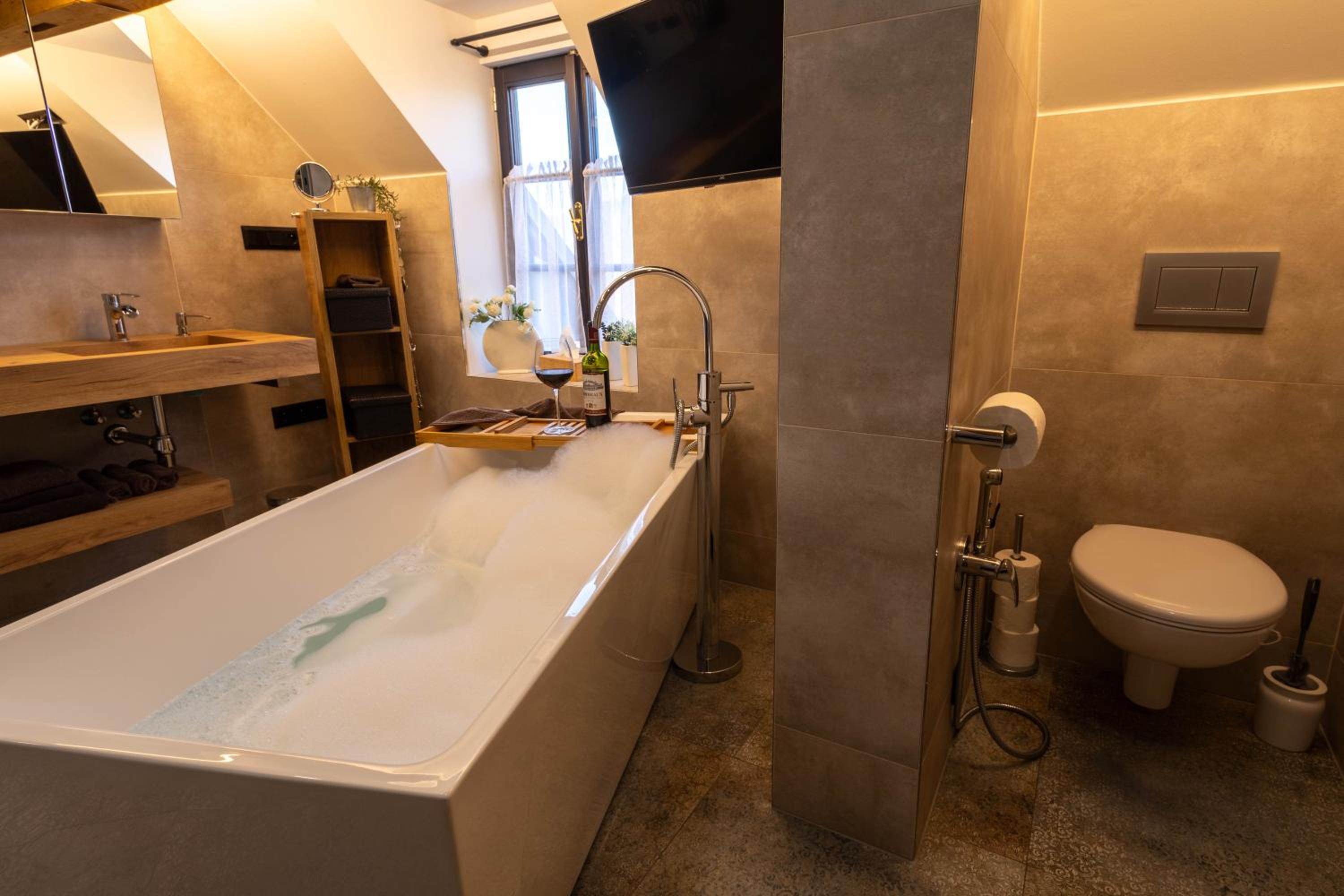 Podkrovní stylový mezonetový apartmán