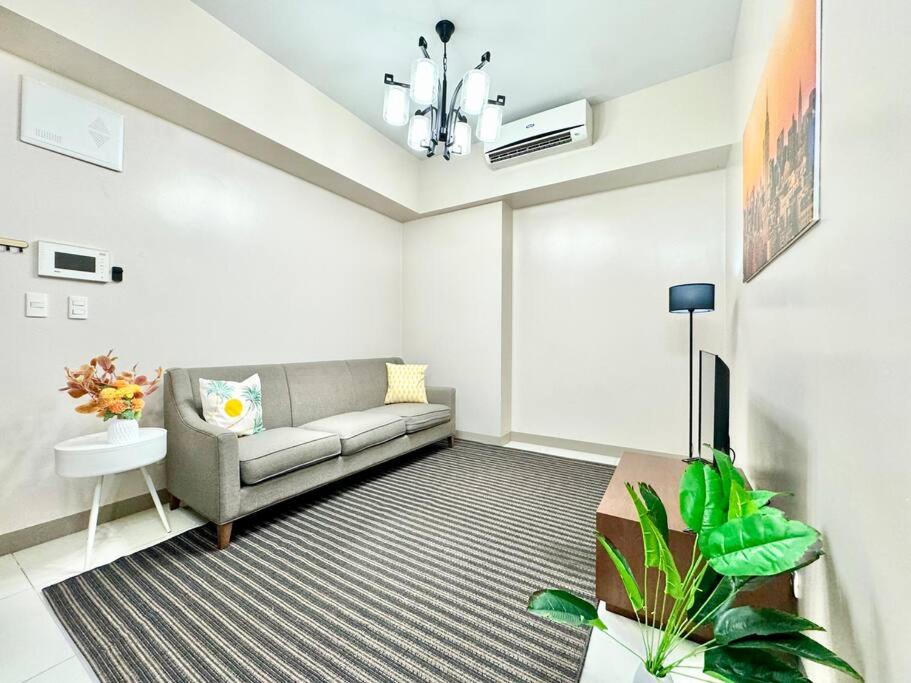 COZI two bedroom family room near Grand Hyatt BGC view 2