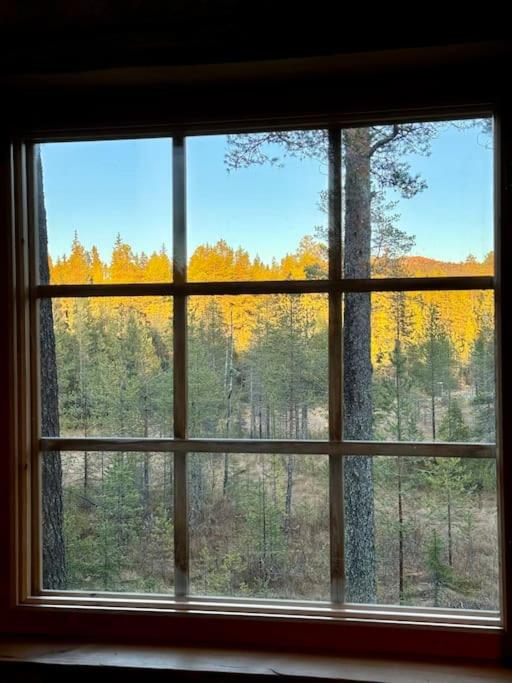 Viehättävä kelomökki Rukalla