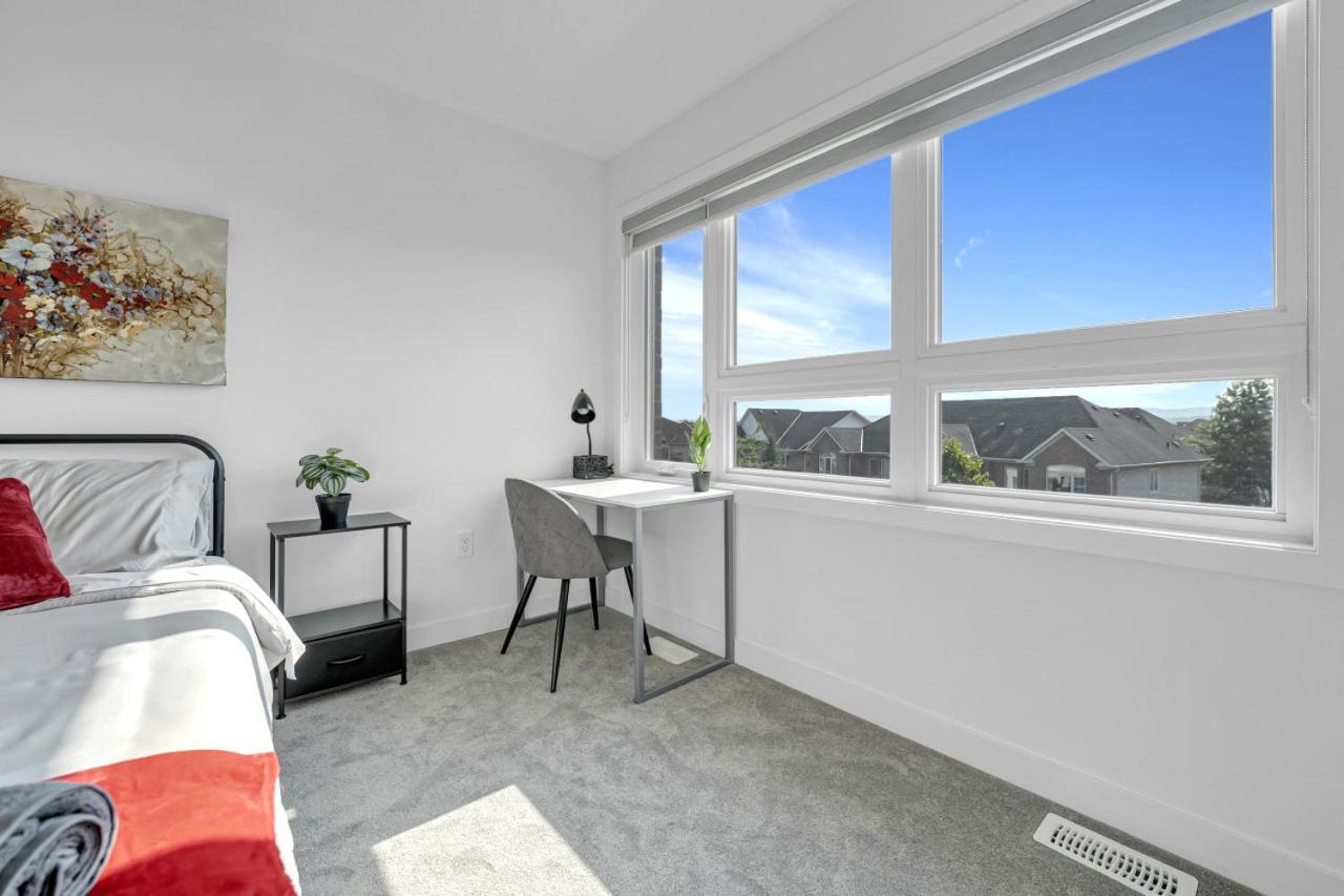 Posh 4 Bed Home with Backyard in Great Location
