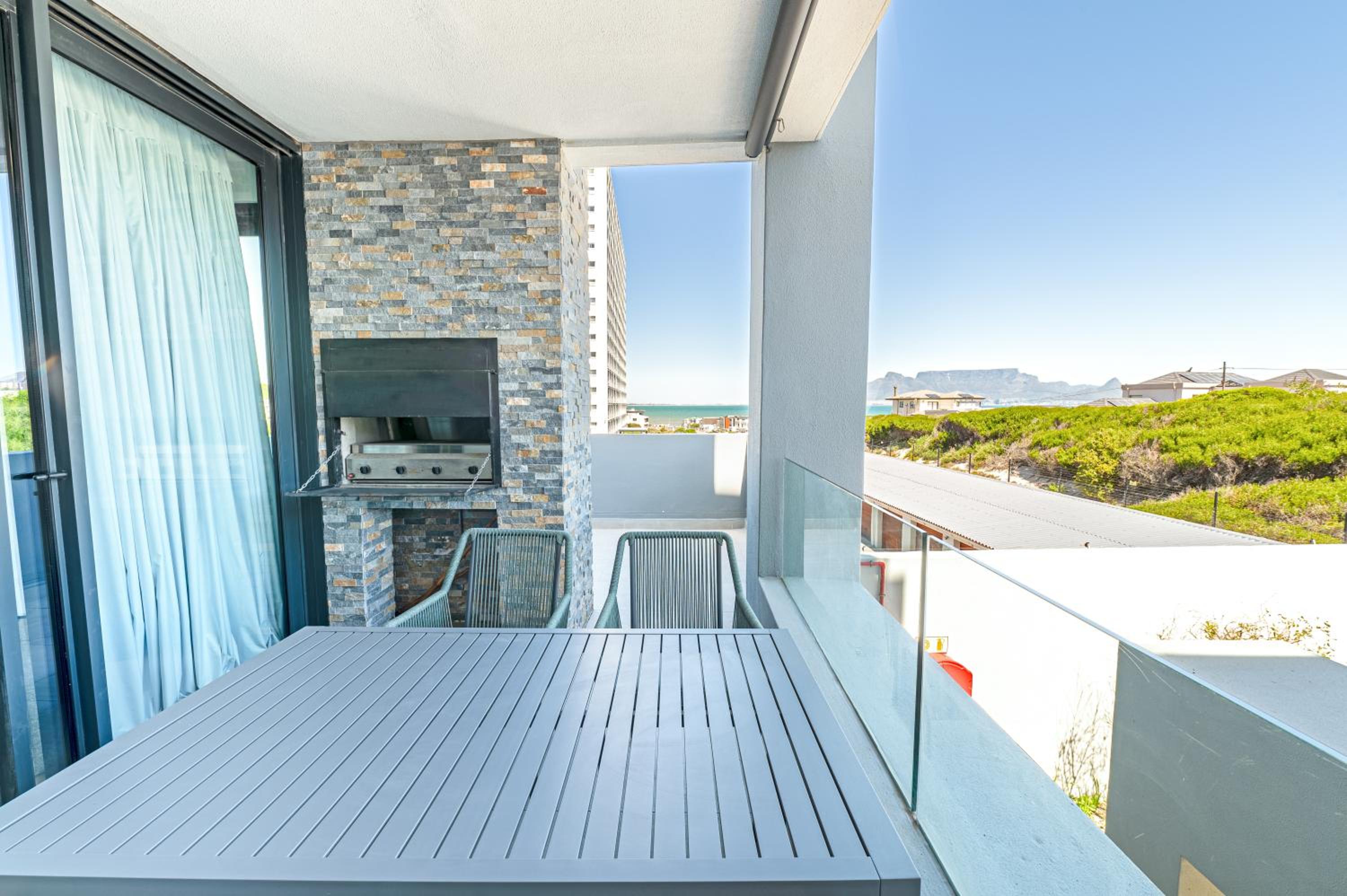 Beachfront Apartment with wrap around terrace in Blouberg, 04 Azul view 5