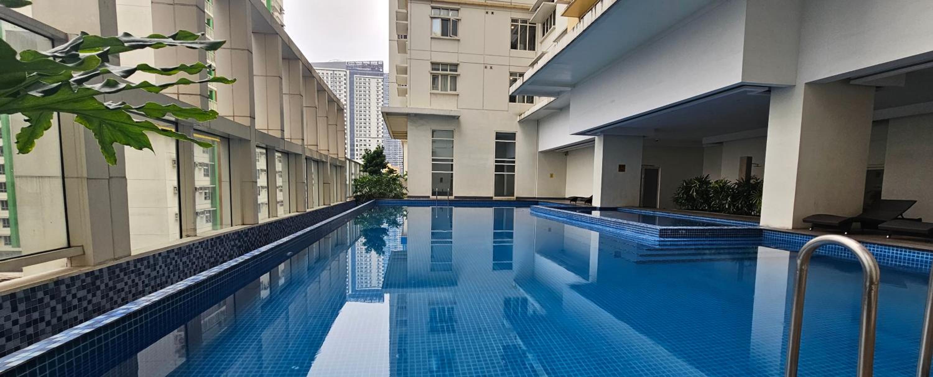 Makati Bliss Apartment - Cozy Urban Retreat view 3