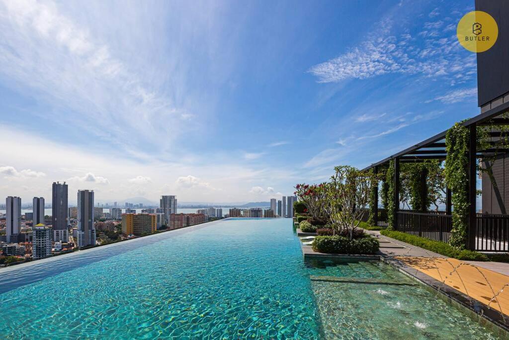 Seaview 2BR Infinity Pool & EasyAccess to Town 13A photo 1