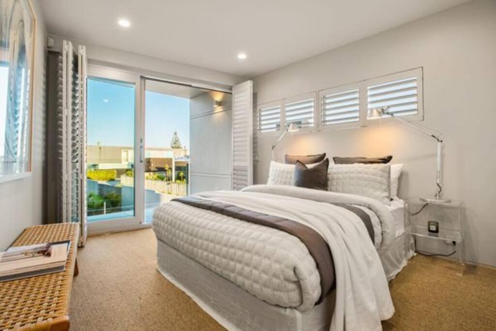 Architectural masterpiece, private beach access view 5