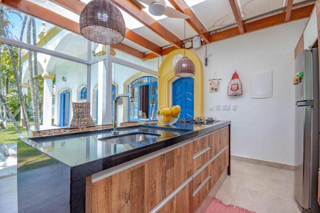 Casa com piscina em Guarujá