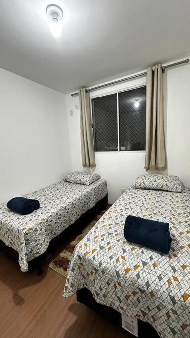 Apê Ruby com 2Q com Ar em 1 Quarto e Garagem