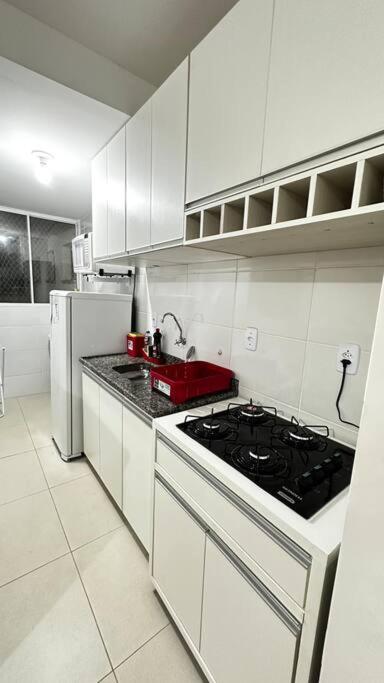 Apê Ruby com 2Q com Ar em 1 Quarto e Garagem