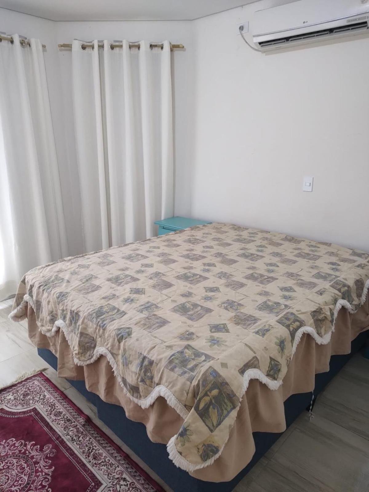 casa 700m da praia, ideal para família, 3 quartos , piscina, ar condicionado, churrasqueira, wi fi, estacionamento, até 10 pessoas,