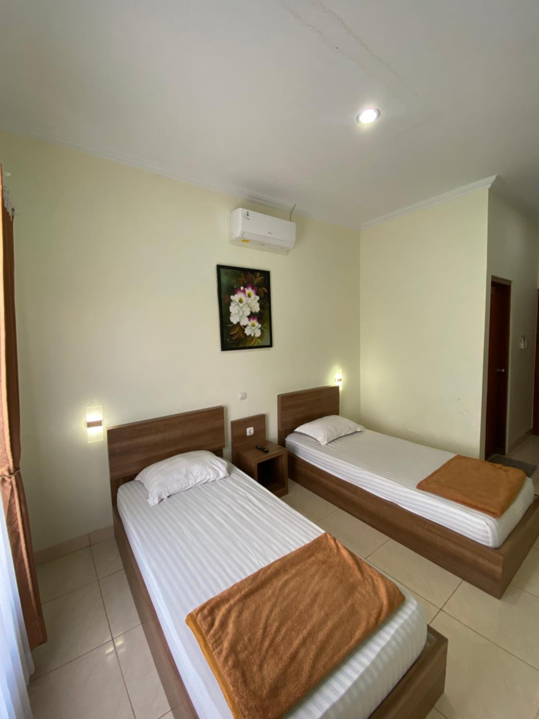 Adiputra Guesthouse HomiQ view 3