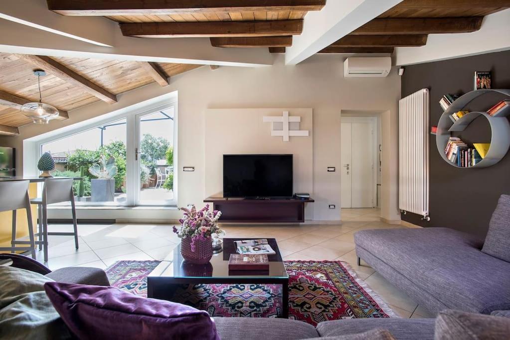 Exclusive City Views from a Sunny Attic Apartment!