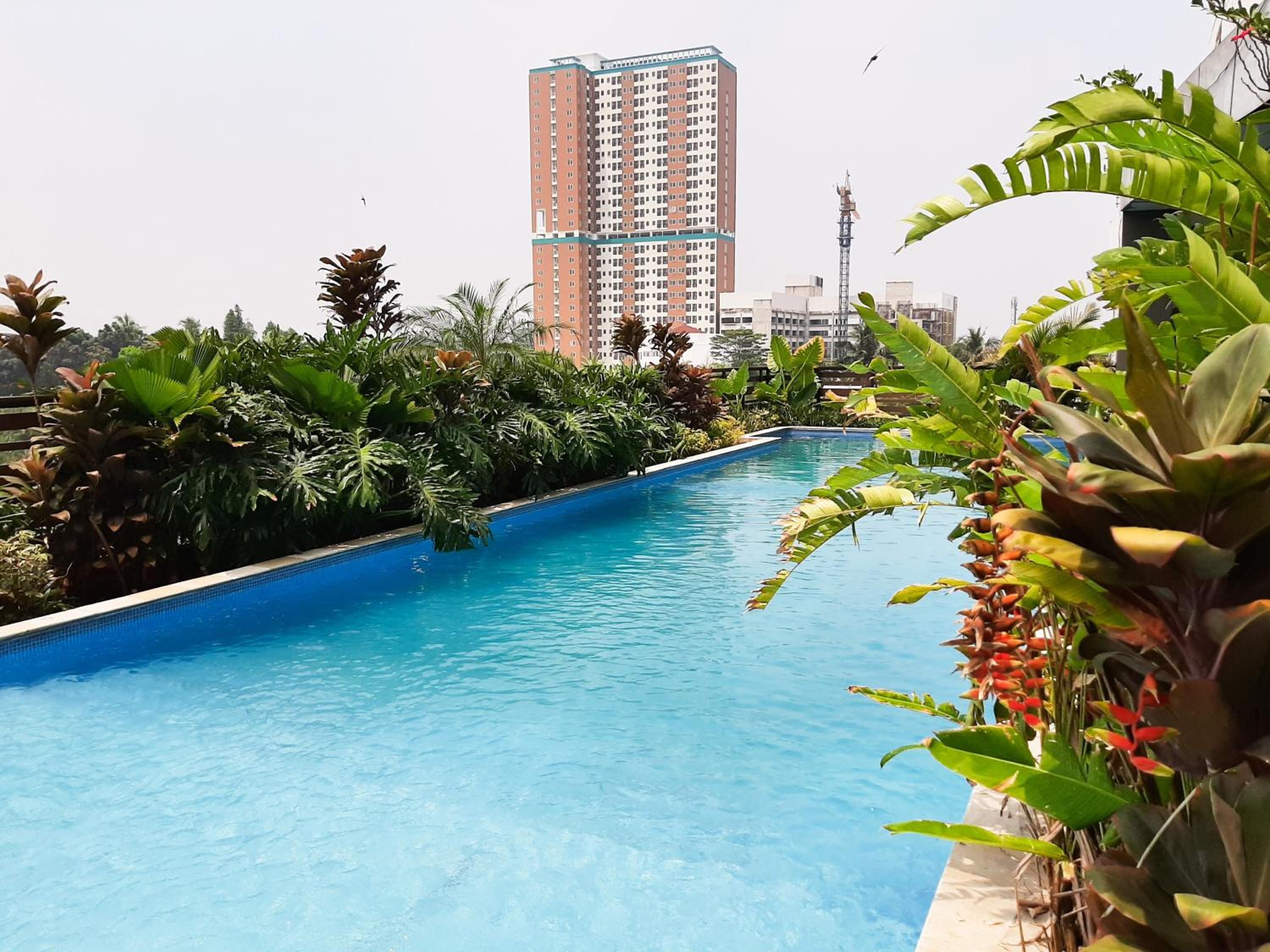 Comfort and Spacious 2BR Apartment at Tuscany Residence BSD City By Travelio