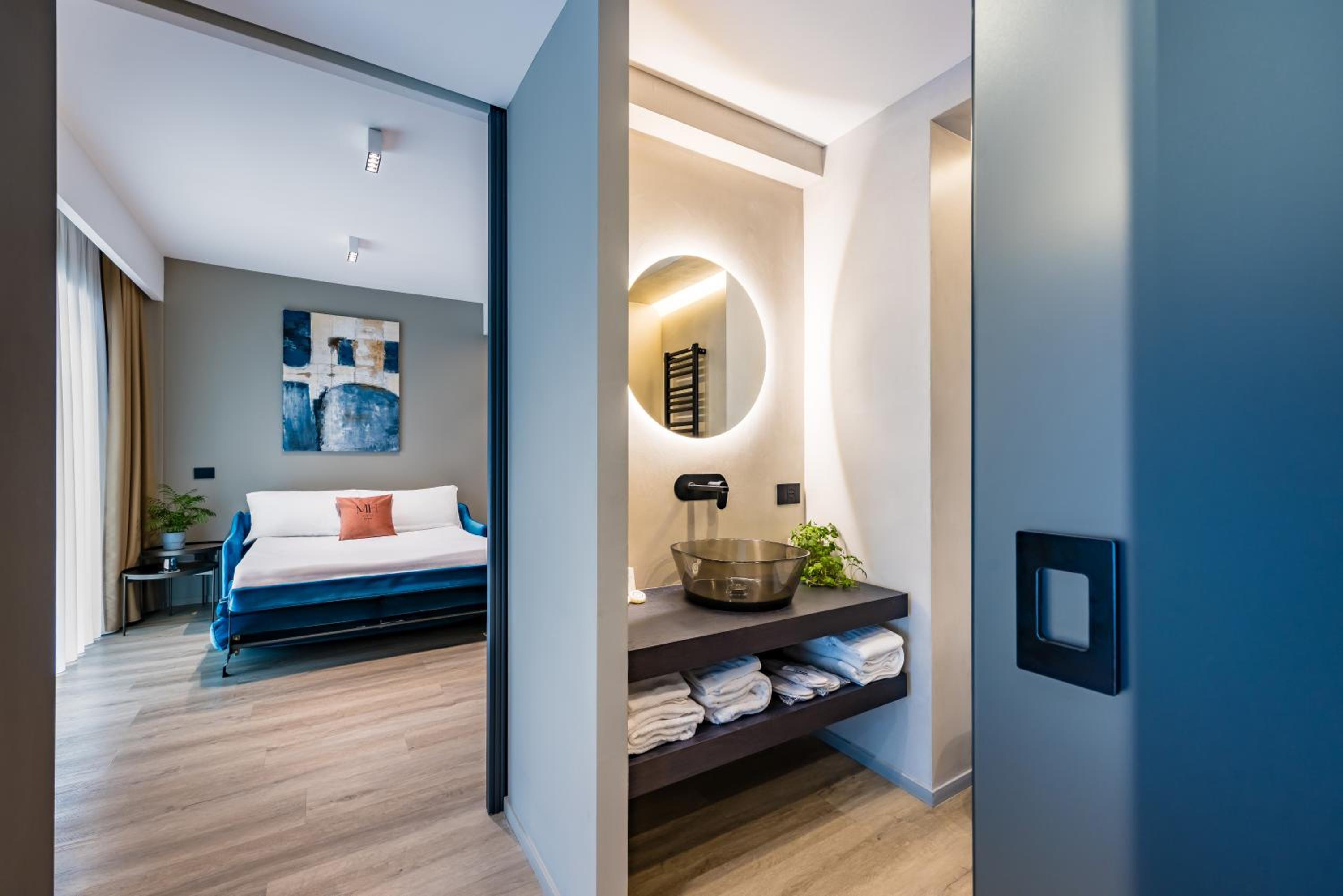 MH SUITES Plebiscito