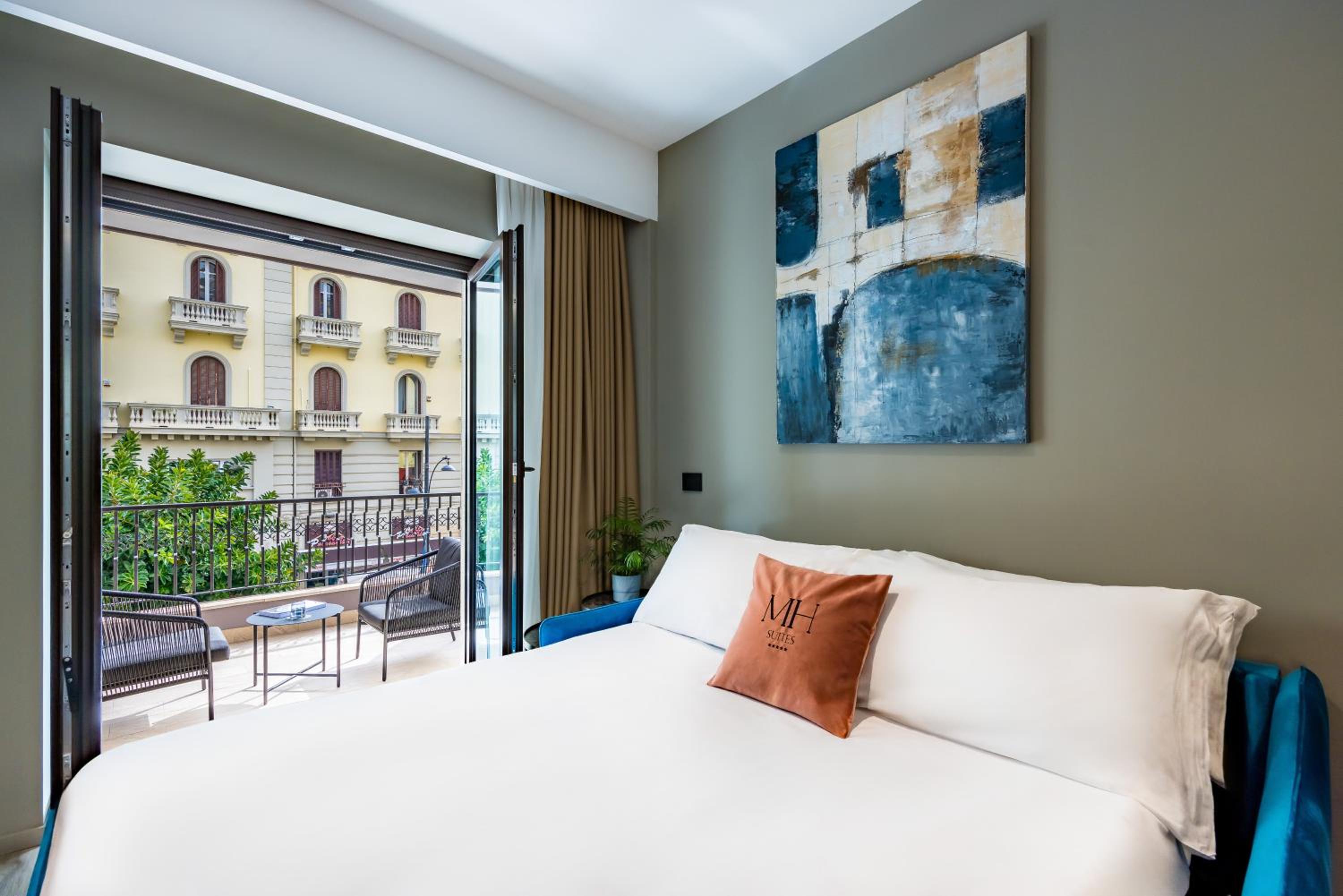 MH SUITES Plebiscito