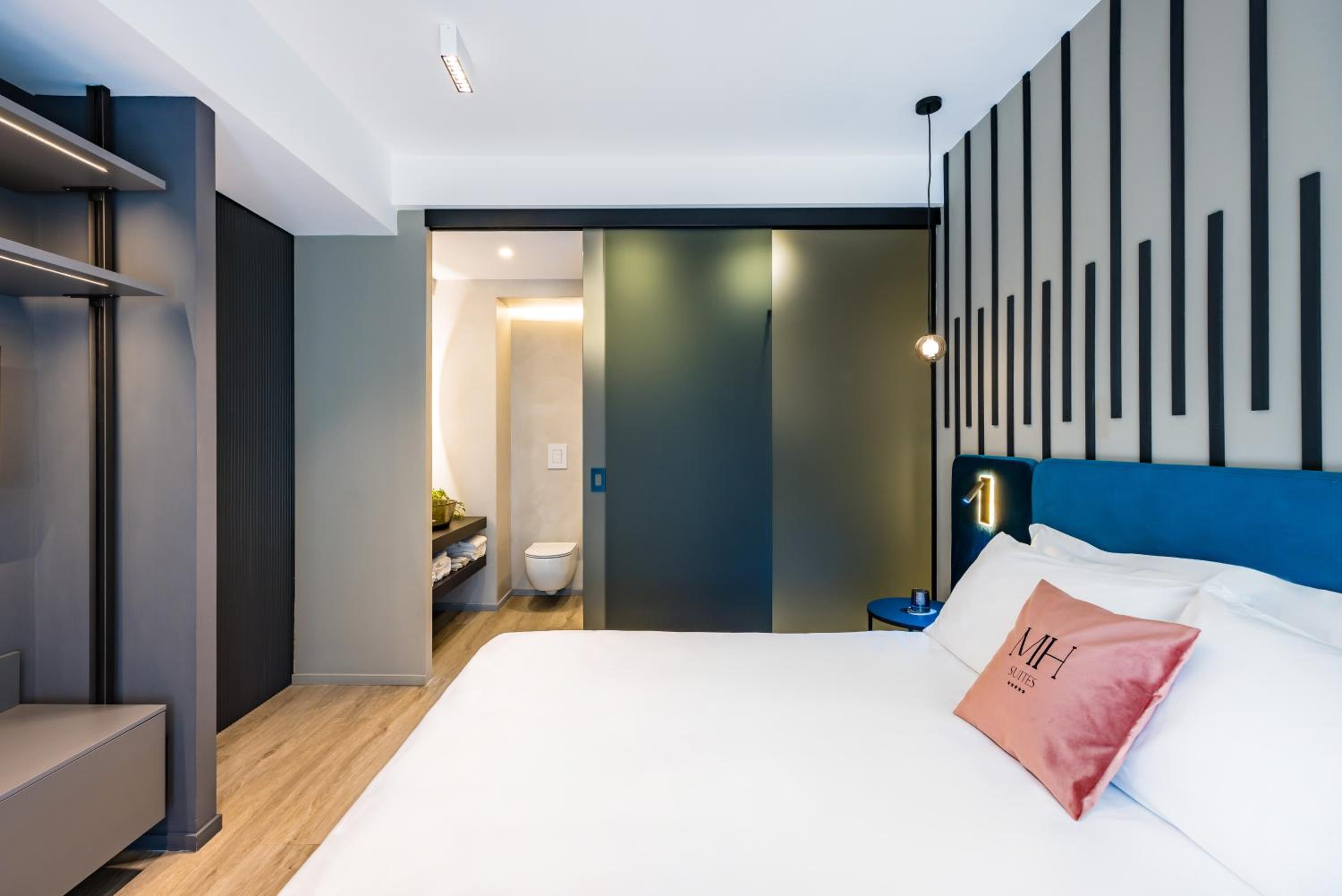 MH SUITES Plebiscito