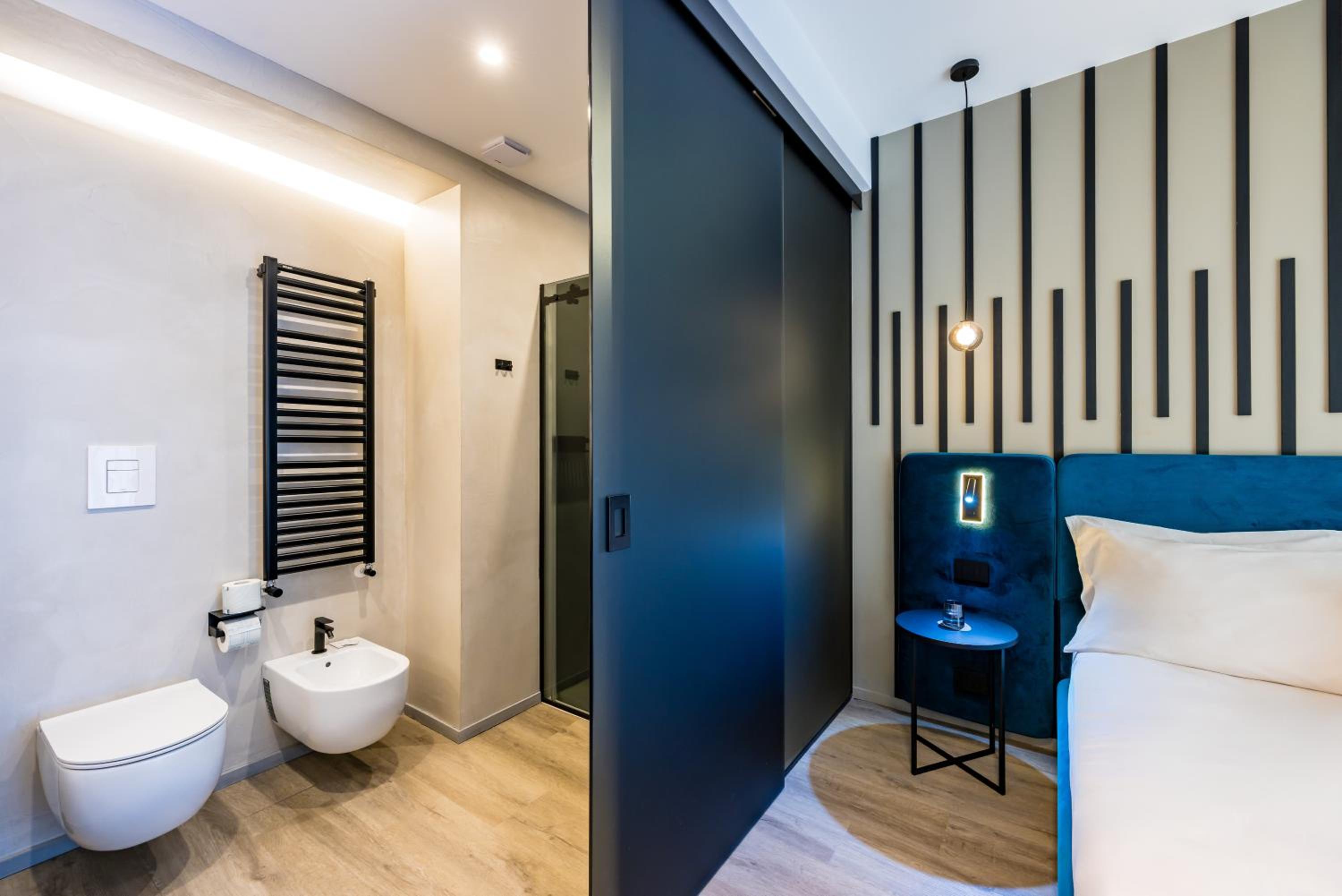 MH SUITES Plebiscito