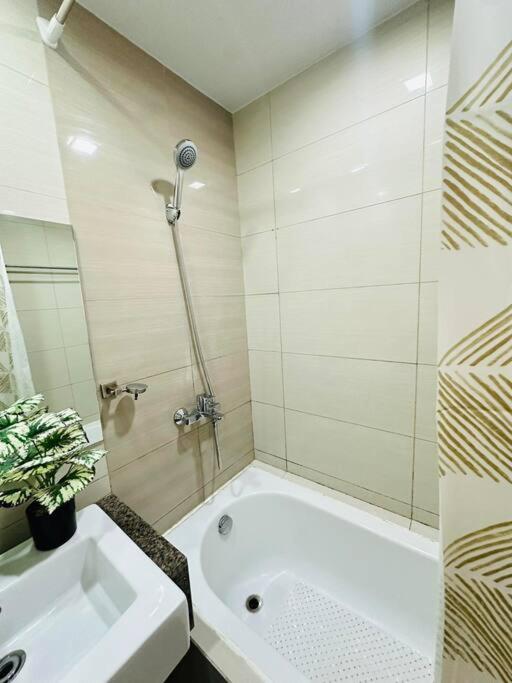1BR Condo Mactan Newtown Near Airport with Beach access view 5