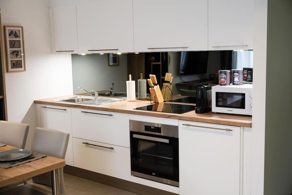 LA Poivriere in Durbuy nieuw appartement met gemeenschappelijke jacuzzi en sauna