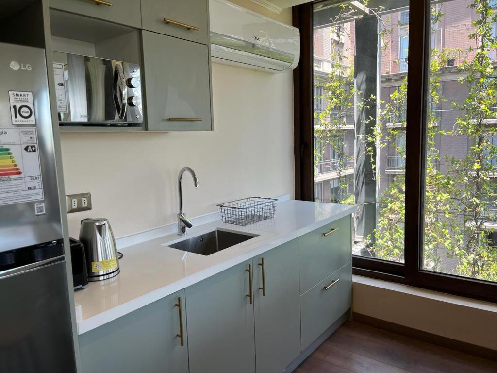HOM I Amplio y Lujoso Depto 4PAX 2D2B En Santiago