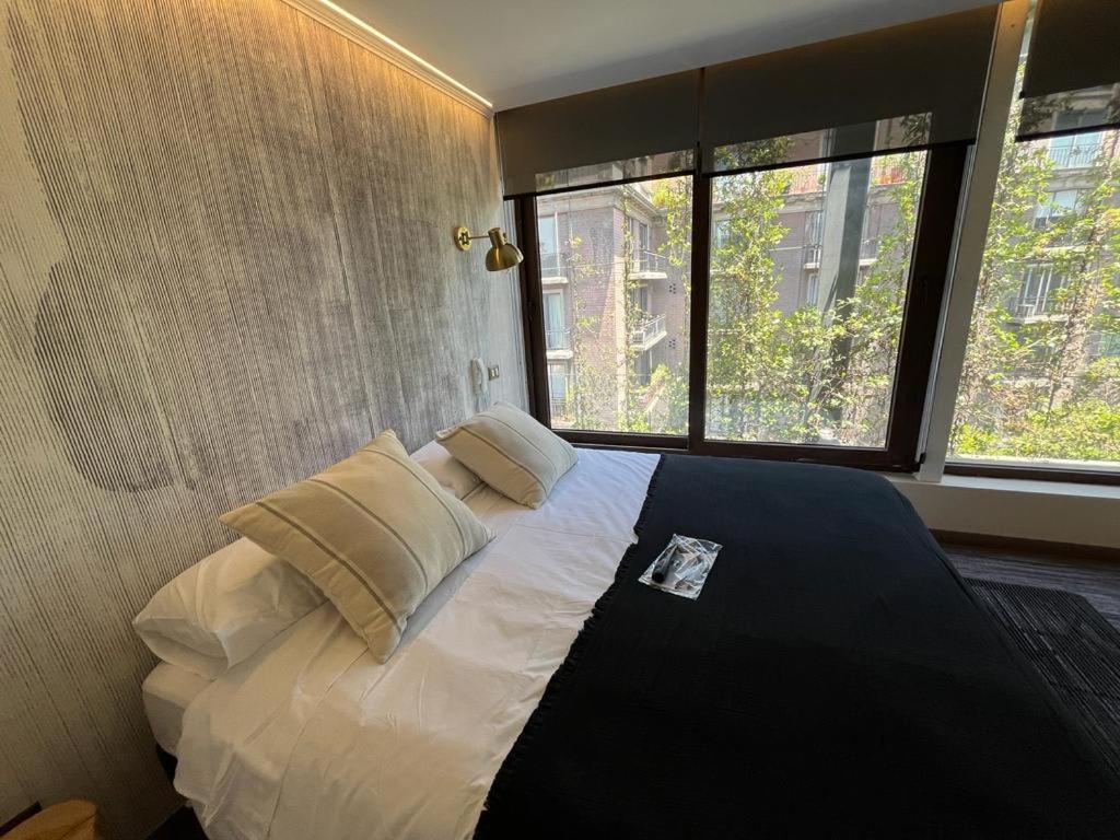 HOM I Amplio y Lujoso Depto 4PAX 2D2B En Santiago