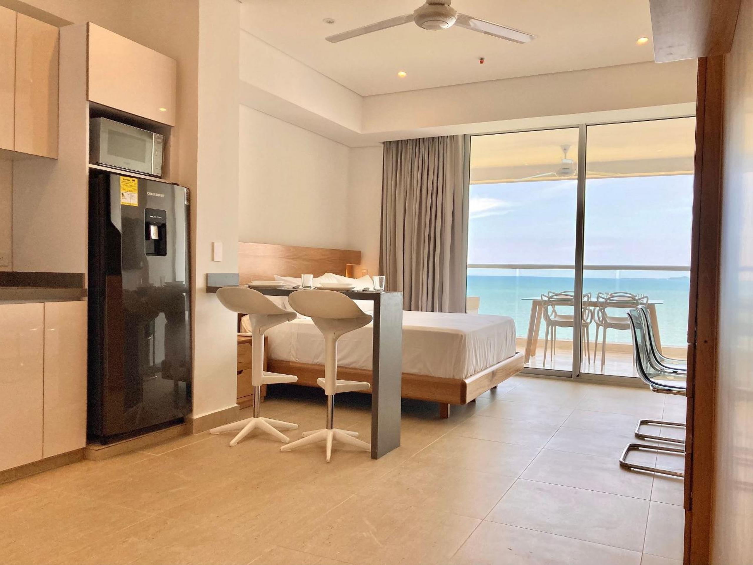 Suite vista al mar con hamaca y 2 camas queen p 12