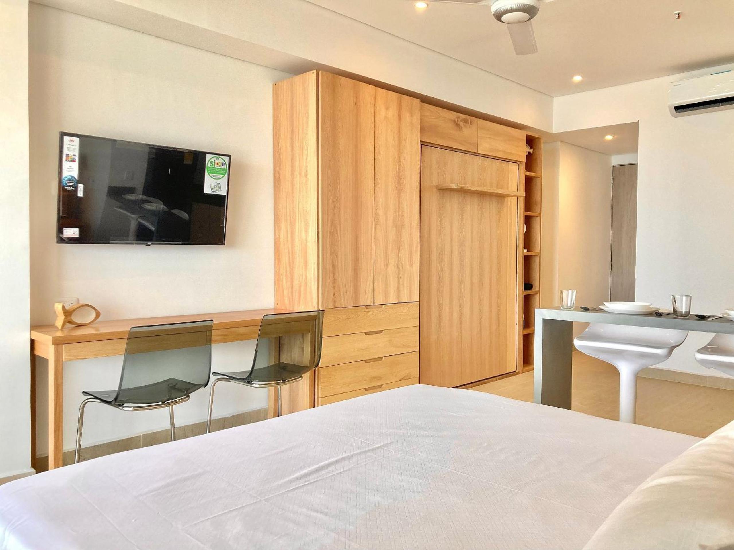 Suite vista al mar con hamaca y 2 camas queen p 12