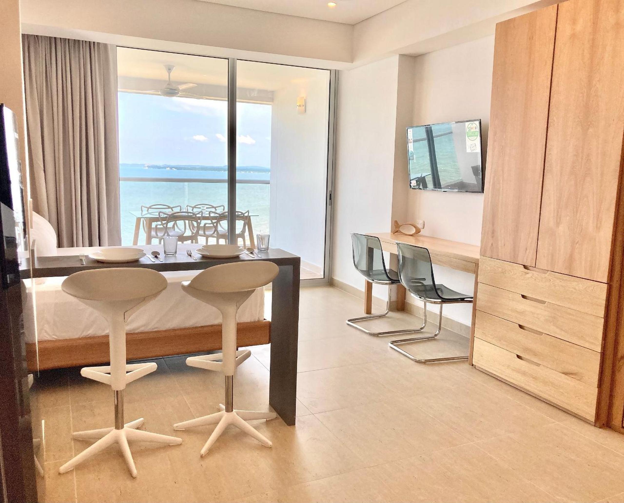 Suite vista al mar con hamaca y 2 camas queen p 12