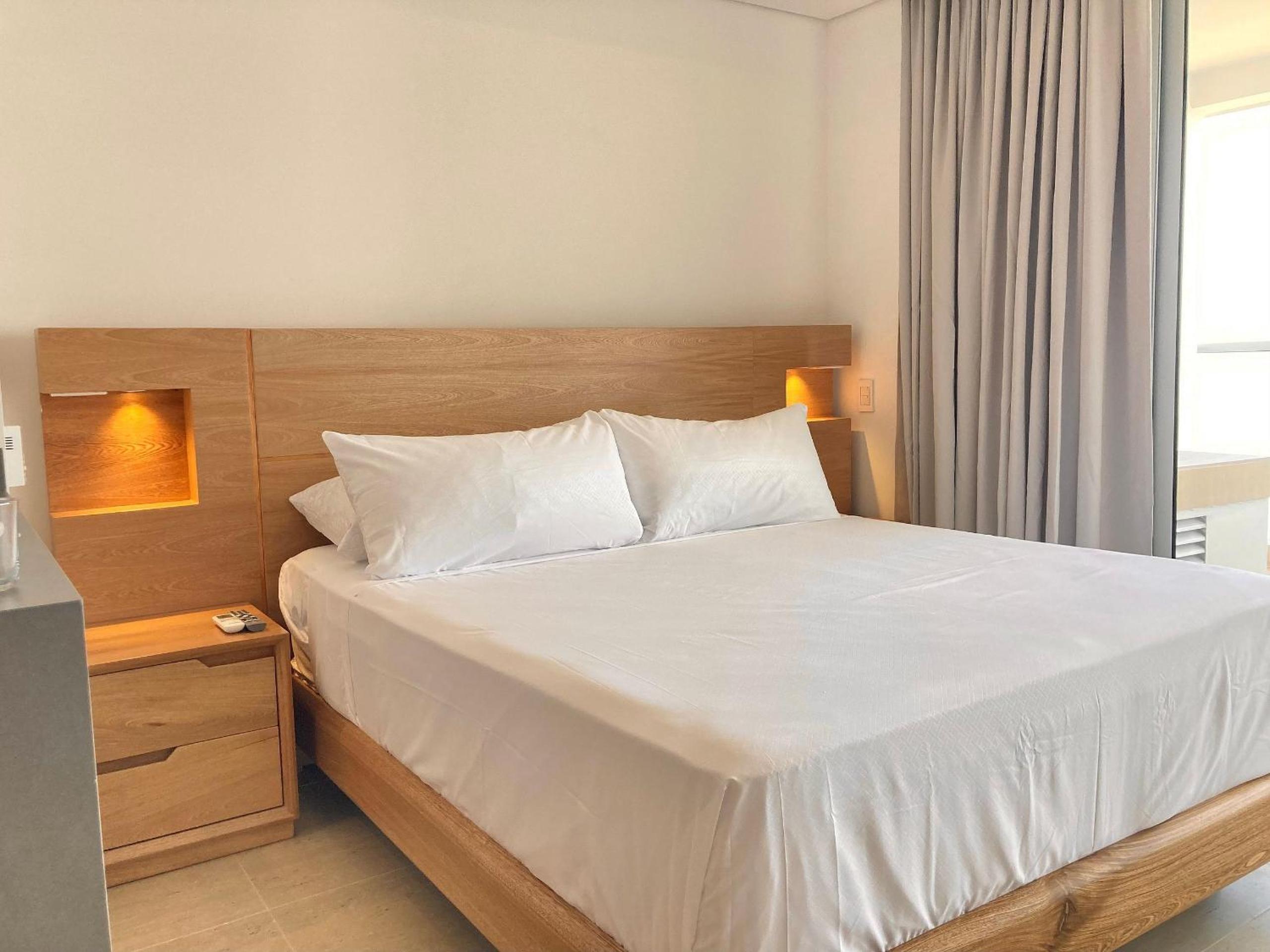 Suite vista al mar con hamaca y 2 camas queen p 12