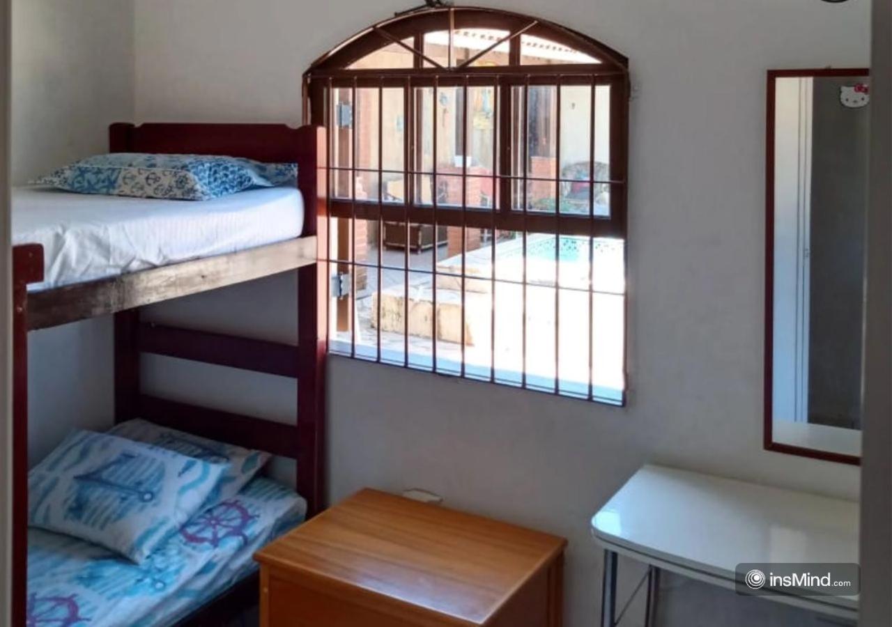Casa em Itanhaém à 800m da praia - Piscina, WiFi, Churrasqueira e Quintal Grande