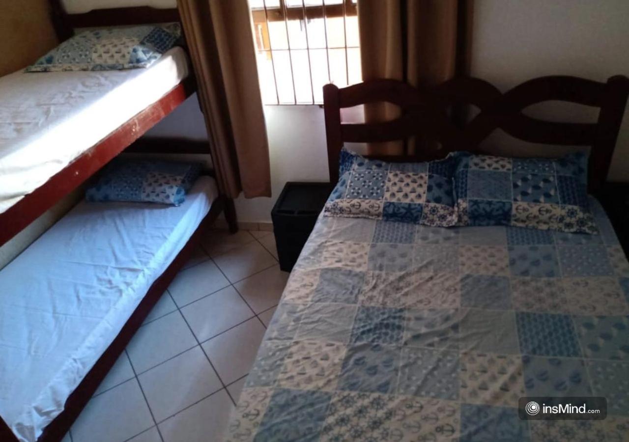Casa em Itanhaém à 800m da praia - Piscina, WiFi, Churrasqueira e Quintal Grande
