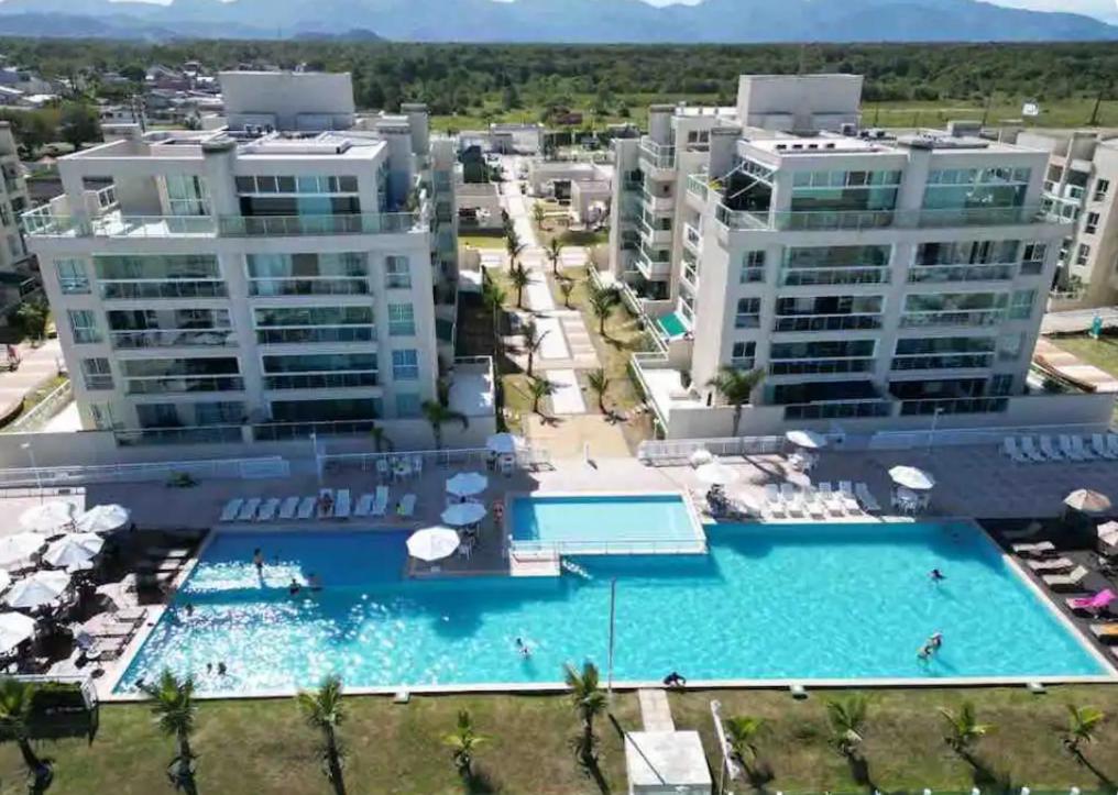 Apartamento em Condomínio Resort à beira mar!