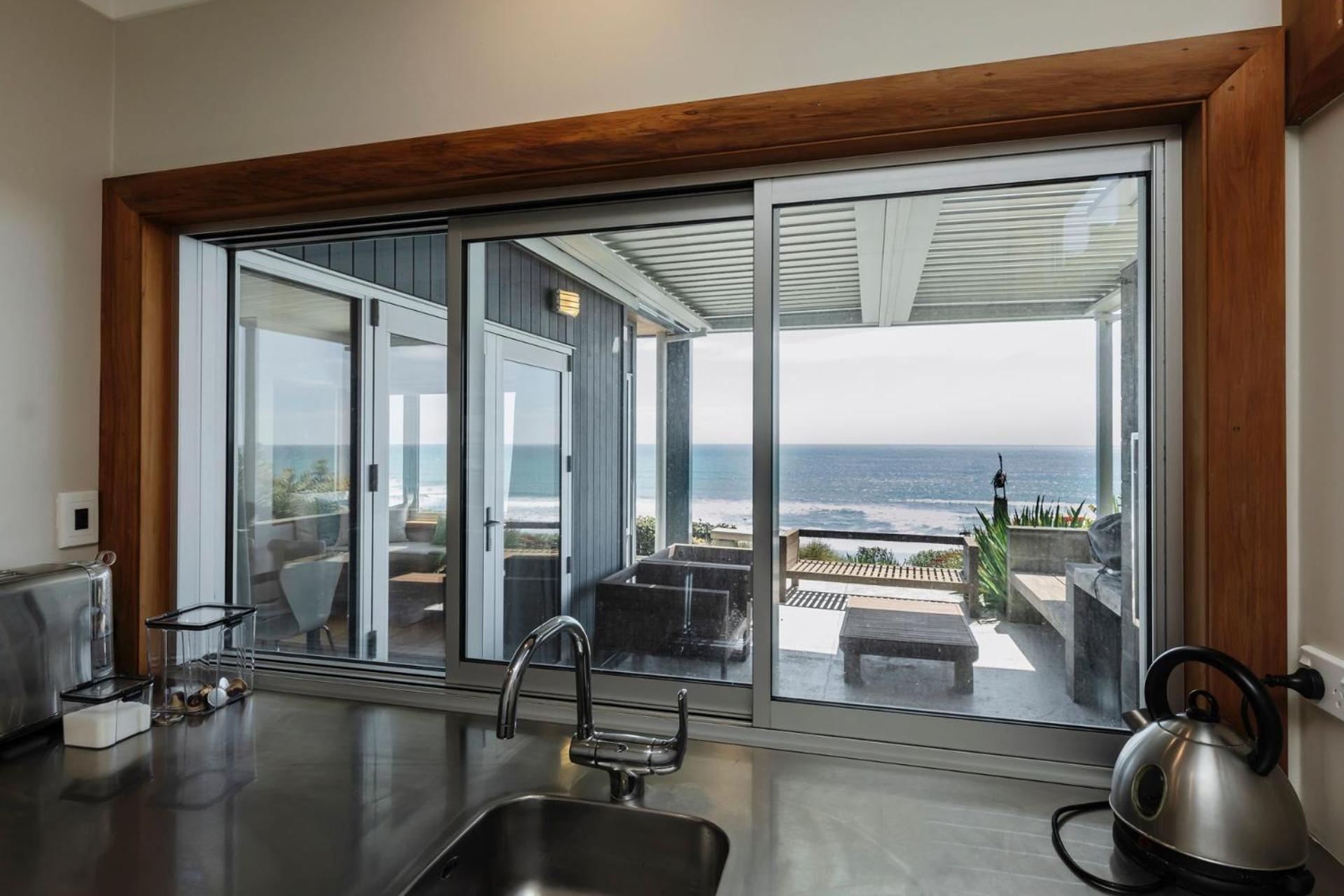 Clifftops - oceanfront retreat in Oakura Beach view 3